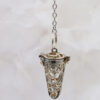 pendule cage